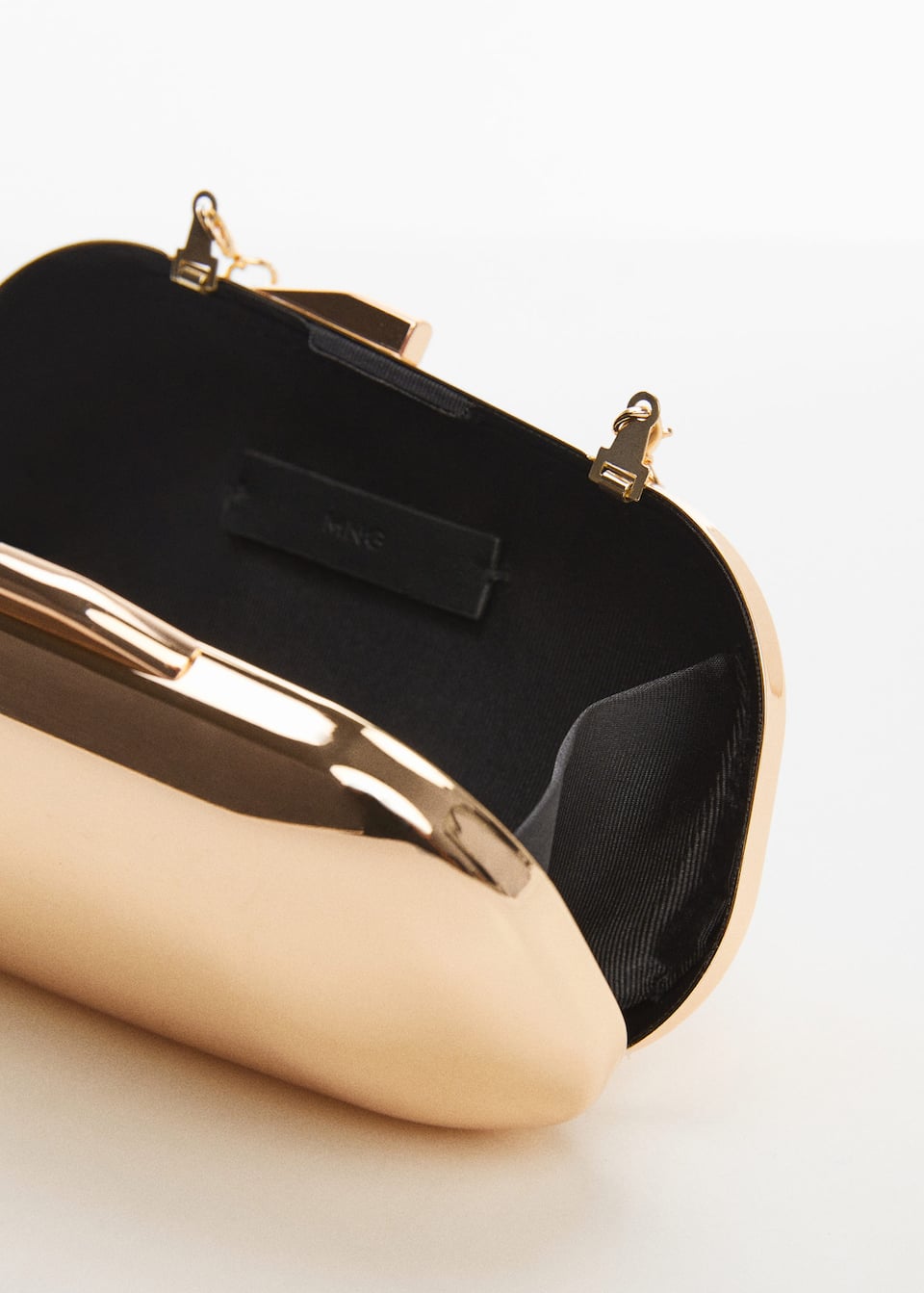Metallic clutch bag